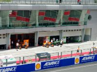 Friday 11 October 2013  We plonk ourselves in front of the giant TV which happens to be in front of the Repsol Honda Teams. : Sepang