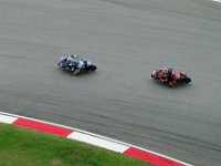 Saturday 12 October 2013 - Qualifying day  Maverick Vinales Spain, KTM leads Luis Salom Spain, KTM through turn 14 during Moto3 FP3. Salom finished FP3 in first while Vinales came third. : Sepang