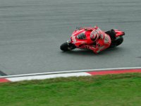 Saturday 12 October 2013 - Qualifying day  Nicky Hayden seems not to get off the bike as much as the others. Look at how high his elbow is from the ground. : Sepang