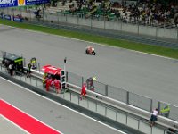 Saturday 12 October 2013 - Qualifying day  Andre Iannoni begins a run with his crew holding out a board to relay information to him.  Interestingly, the label on the board reads   The Maniac JOE : Sepang