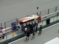 Saturday 12 October 2013 - Qualifying day  Honda staff monitor the progress of their riders. On race day they are joined by Shuhei Nakamoto, HRC Executive Vice President. Emilio Alzamora, Marquez' mentor, is at the right side of the picture. : Sepang