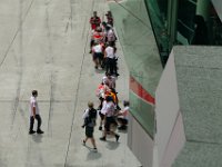 Saturday 12 October 2013 - Qualifying day  There is a quick scramble while the Repsol Honda riders have their rear tyres changed.  It is usual to change tyres rather than for them to use their second bikes. : Sepang