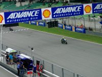 Saturday 12 October 2013 - Qualifying day  Rossi starts his fast lap (top speed 323.3 kmh). He is followed by Aleix Espargaro who qualified ninth ahead of both factory Ducatis. : Sepang