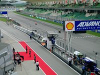 Saturday 12 October 2013 - Qualifying day  Bradley Smith and Marc Marquez receive the checkered flag. : Sepang