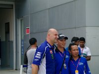 Sunday 13 October 2013 - Race day  Paolo Giannotta obliges the fans. Paulo is listed as a driver/helper which I'm guessing is code for bodyguard. : Sepang