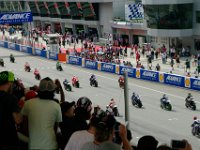 Sunday 13 October 2013 - Race day  Only about 1 minute late, the MotoGP riders begin their warmup lap. : Sepang