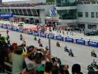 Sunday 13 October 2013 - Race day  The red flag is out and will be taken away once the marshall at the back waves the green flag to indicate that the grid has reassembled. : Sepang