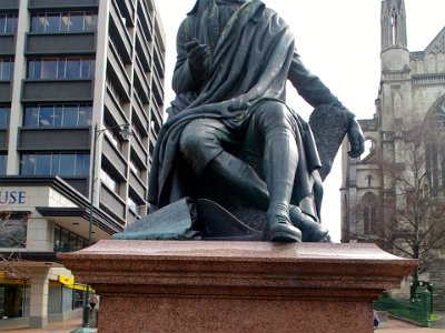 Day 2 - 40th Anniversary trip to NZ  The parkland in front of the Town Hall is called The Octagon in which sits a statue of famed Scottish poet Robert Burns.