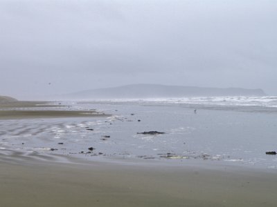 Day 4 - 40th Anniversary trip to NZ  It is very cold, raining and an angry surf is running.  I think standing on this beach is the farthest south I’ve ever been and I have no wish to go any farther south.