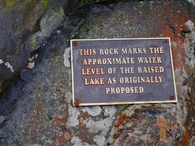 Day 4 - 40th Anniversary trip to NZ  This plaque on the opposite side shows where the high water mark would have been had the project gone ahead. In the end, both sides agreed to a compromise plan that still produced electricity but saved NZ's largest and second largest freshwater  lakes. Praises be to people like this who preserved this magnificent asset for future generations to enjoy.