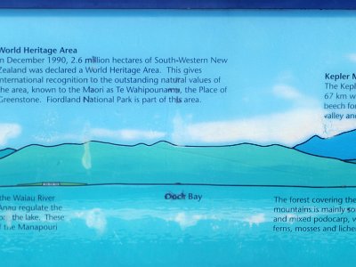 Day 4 - 40th Anniversary trip to NZ  This plaque beside the lake describes the mountains and stands of native trees in the Fiordland National Park on the opposite side.