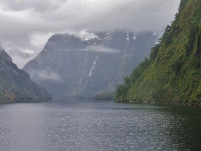 Day 5 - 40th Anniversary trip to NZ  We enter the Hall Arm and the captain again stops the boat and points out the fractures in the mountain in front of us.