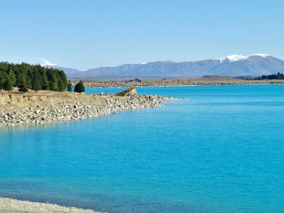 Day 6 - 40th Anniversary trip to NZ  We drive through Omarama to Twizel. Here the road goes past an artificial lake, Lake Pukaki. What’s memorable about this lake is that the water is the bluest of blues which means the lake is not stagnant and continually replenishes.