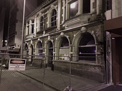 Day 7 - 40th Anniversary trip to NZ  As night falls, we drive into the city to a Mexican restaurant for dinner. It is in an area devastated by the 2011 earthquakes.   The entire city block is either vacant land where buildings once stood or damaged, abandoned buildings.