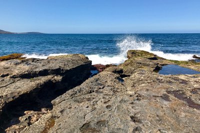 Saturday 21-10-2017 Depot Beach Rocks - JGR  Jenni attempts to get a picture of a wave breaking but the ocean does not cooperate