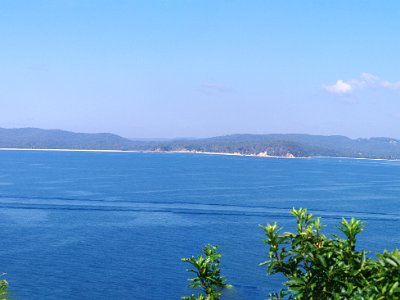 PENT2777-panorama     MONDAY Eden Rotary Park and Lookout  The strip of sand on the left is 3.7 km (2.3 mi) away on the foreshores of Boydtown and is ~2.6 kms long. The strip of sand on the right is about 2.3 kms.