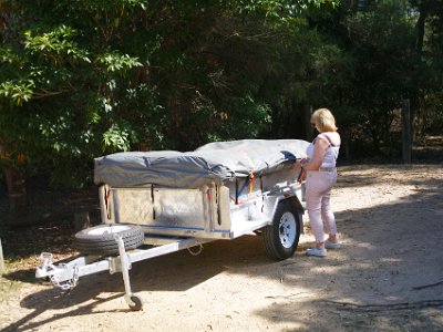 PENT2640-1     SATURDAY Arrive at Hobart Beach  We get off the back roads and join the Sapphire Coast Drive to Hobart Beach.  We arrive at the camp area at 15:30 after about 7 hours driving time. It is 500 kms (310 mi) door to door. Jenni helps to unpack.