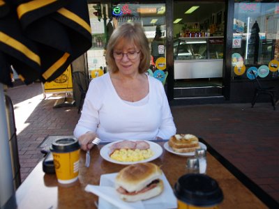 SUNDAY MORNING  Merimbula for breakfast  My bacon/egg roll was processed bacon with overcooked egg on supermarket bread. Jenni's was similar.  We're not off to a good start here.  The coffee was adequate.