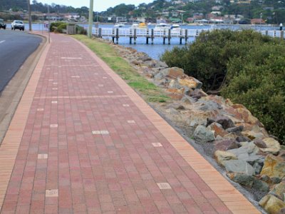 TUESDAY Afternoon at Merimbula  We are walking to the boardwalk nearby.  On our way we see these tiles inlaid to the path and think what a great idea this is: donate some money and get your name, company or organisation cast in concrete for years to come.  All it takes is someone to organise it and knock on a few doors.