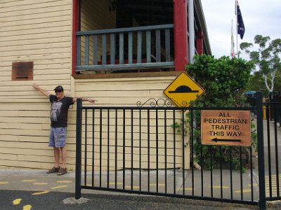 TUESDAY The Bega cheese factory  What  confusing signs these are; both signs point in opposite directions. The yellow painted footsteps help me work it out.