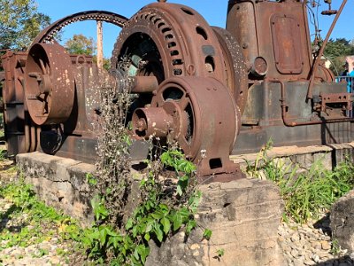 There are two steam boilers on the site. This is the remains of a large electrical generator driven by one steam engine while the other boiler drives the saw mill equipment.