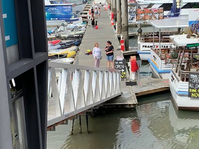 She goes down onto the wharf and talks with one of the staff. It seems like it's a good idea, not expensive and should be fun.  Definitely on the list for tonight - I actually feel like fish 'n chips not having had any seafood on our travels as yet.