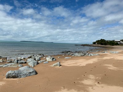 I am fascinated by the blue rocks in this part of the beach, visible in this picture. I grab a couple of small samples to take a further look when I get home. We don't see any dugongs so we get back in the car and head south again.