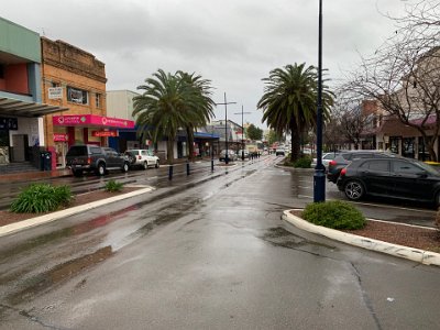 The main street has been reduced to one lane each way with the space gained turned into parking and public space.