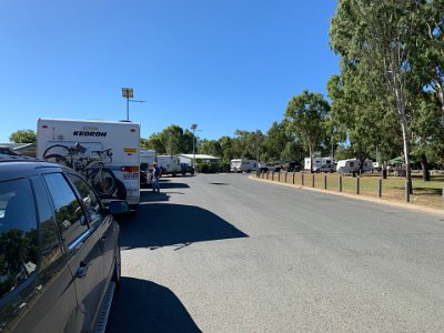 Queensland has "Tourist friendly" laws and these laws permit campers to stay for up to 24 hours in roadside rest areas. They even provide showers and toilets at these stops.