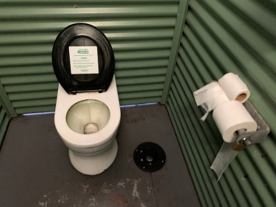 What's it like inside one of these toilets you ask? Pretty good: clean, lots of (locked) toilet paper, no graffiti. Press the pedal to flush when you've finished.