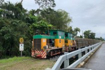 The road takes us past cane fields and some of it is being harvested. We even see a cane train operating as it collects the cut (but not burnt) cane.