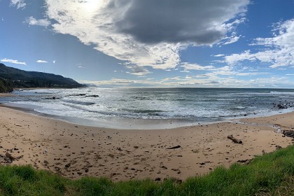 Tuesday 26 July 2022 Panorama of the beach. A line of ships waits on the horizon.