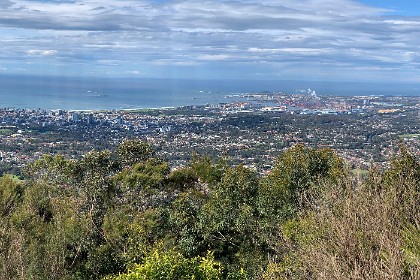 Tuesday 26 July 2022 Port Kembla is 8 kms to the south of Wollongong. Port Kembla   "is an international trade gateway for bulk agricultural, construction and mining industries. It is New South Wales’ largest motor vehicle import hub and home to the state's largest grain export terminal and second largest coal export port."