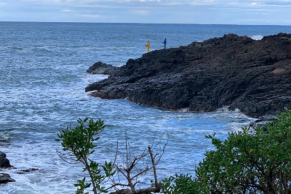 Tuesday 26 July 2022 People fish from a quieter spot on the headland