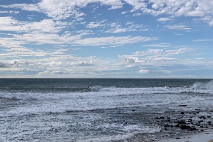 Tuesday 26 July 2022 At the beach the surfers are out.