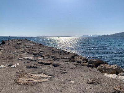 Saturday, 4 March 2023 Fishing at ‎Côte de l'Esterel...in summer, this breakwater would be heaving with people.