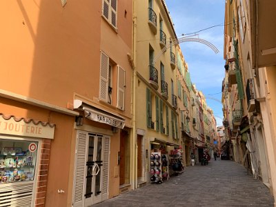 Tuesday, 7 March 2023 Souvenir shops in Rue Basse near the palace.  I imagine these streets would be heaving with people in summer.