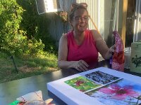 Xmas at Kandos with Jacqui and Jess 25/12/2025  We exchange gifts. Jenni presented Jacqui with a photo montage of pictures that she had previously taken at Jacqui's place.