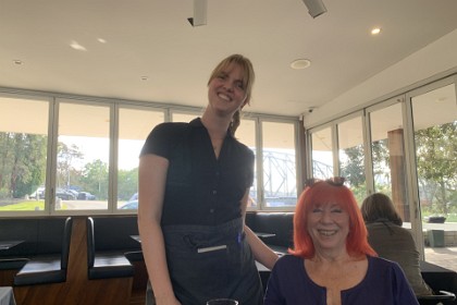 Sunday, 5th July 2025 This is a very nice waitress called Evie.  Evie helps Jenni with important decisions like "Red or white?"