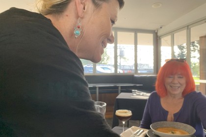 Sunday, 5th July 2025  Finally (well it wasn't ages) Kellie serves us a huge plate of lobster bisque. Our Chef, Toshi, uses all the gooey stuff in the lobster head to make this delicious entree. By the way, I always refer to Kellie as a waitress.  To me a "server" may be non-sexist but a server is connected to the web and it is where your Internet pages go