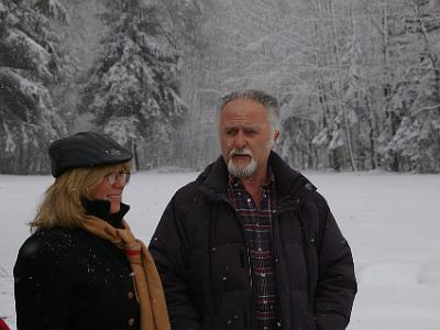 Tuesday 11  April, 2006   Claus and Jenni stand in the snow and chat a bit - good place for a chat. The hat Jenni's wearing is the one she got at the Harley shop in Chicago.