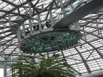 Tuesday 11  April, 2006   In total, there are 1,754 pieces of glass with a total weight of 380 tons. Hangar 7 is 14.5 metres high and the steel frames holding the glass weigh 1,200 tons.