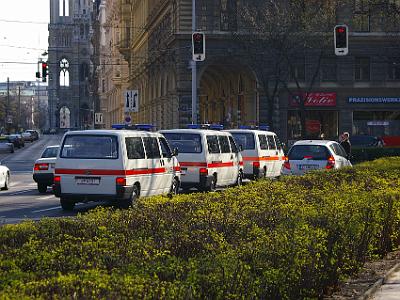 Saturday 8 April, 2006  We don't get very far before another grand building takes our eye. Police cars in the foreground.