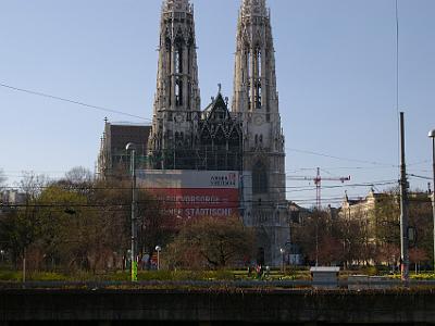 Saturday 8 April, 2006  Looking from the terminus, across Sigmund Freud Park, we can see that the Votivkirche is undergoing some restoration.