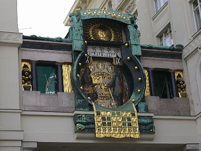 Sunday 9  April, 2006  The Anker Insurance Clock spans two buildings. During the course of 12 hours, 12 of Vienna’s historical figures move across the bridge. At noon there is a parade of all 12 figures accompanied by a ten minute medley of organ music.