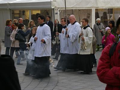 Sunday 9  April, 2006  That thing he is swinging is called a censer (a container for burning incense, especially one that is swung on a chain, in a religious ritual). It wards off evil spirits.