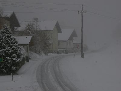 Tuesday 11  April, 2006   . . .  and up the street was blanketed in snow.