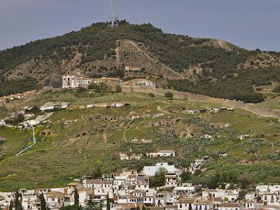 Sunday 2 April, 2006  A better view of the Palacio de Dar-al-Horra. The Moorish defensive walls can be seen to the left going up to the palace and back down again. Below the palace are the cliff dwellings in Sacromonte.