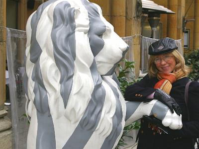 Friday 14 April, 2006  Posing with a lion outside a beer hall - for which Munich is famous.