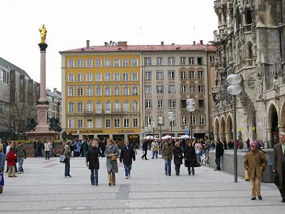 Friday 14 April, 2006  The New Town Hall (Neues Rathaus) dominates Marienplatz.  It hosts the city government including the city council, offices of the mayors and part of the administration. Virgin Mary atop the Mariensäule is visible at the back of the square.